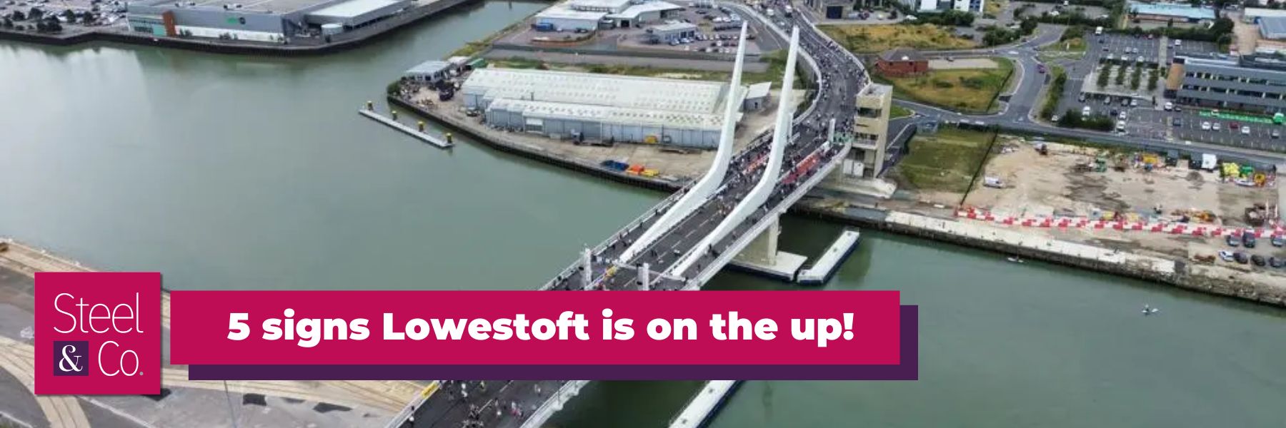 Aerial view of Lowestoft’s Gull Wing Bridge spanning across the water, connecting the northern and southern parts of the town. The modern structure enhances Lowestoft’s transport links and serves as an iconic new landmark in the town’s regeneration efforts.